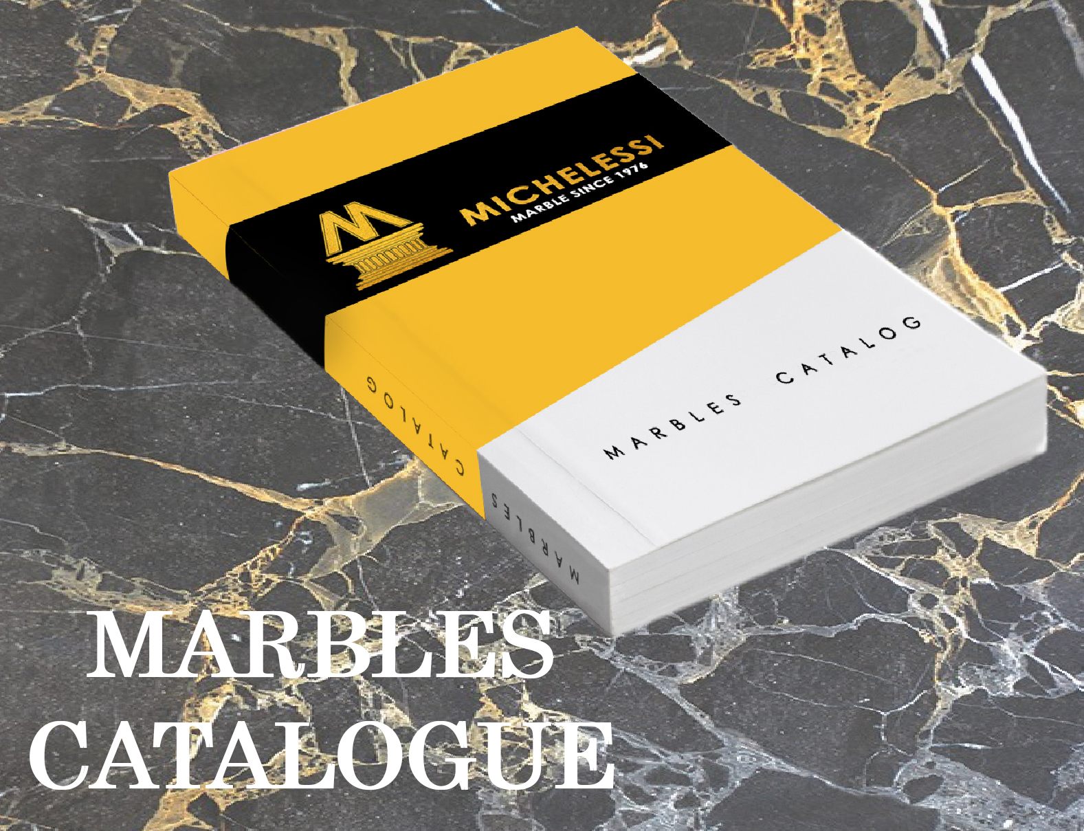 Catalogo marmi Michelessi giallo e nero appoggiato su una superficie di marmo Portoro nero e oro