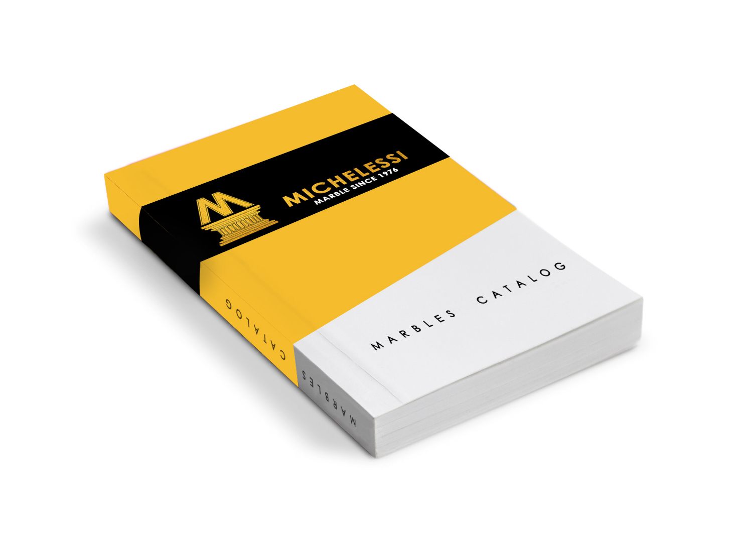 Mockup del catalogo marmi Michelessi con copertina gialla e nera su fondo bianco
