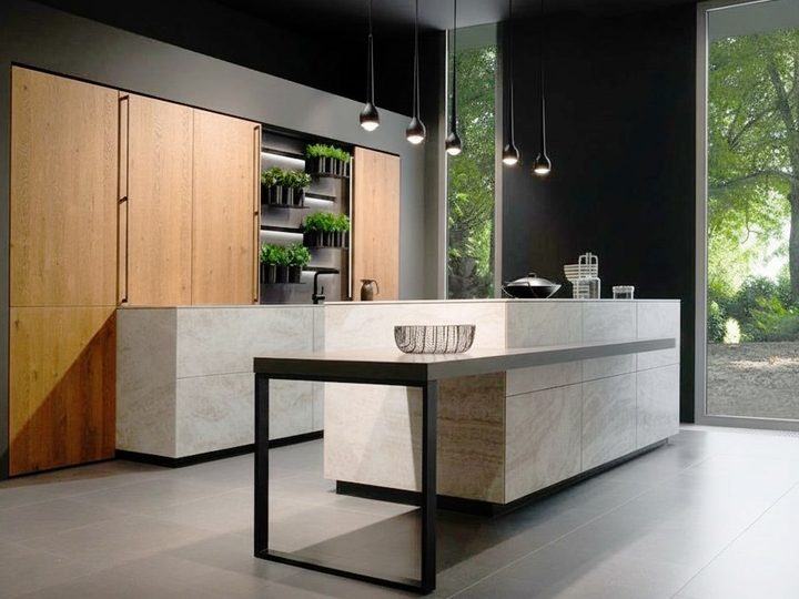 Kitchen clad in stone-effect porcelain stoneware with island and integrated side table