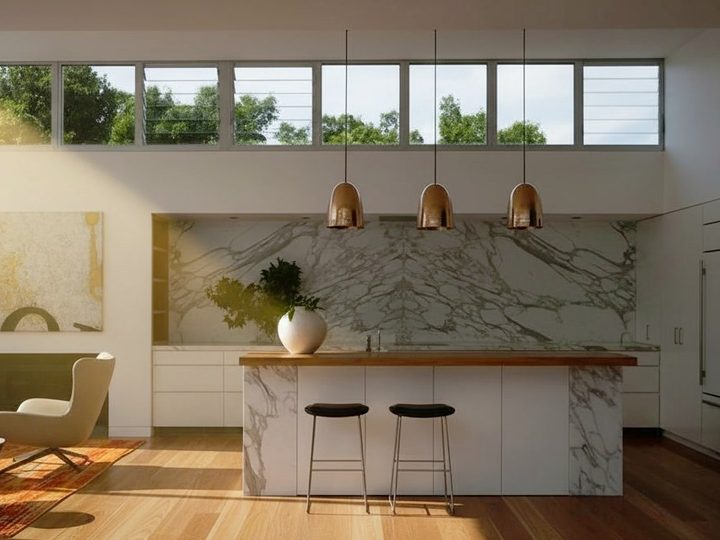 Minimal kitchen with recessed Carrara marble wall and island with wooden top