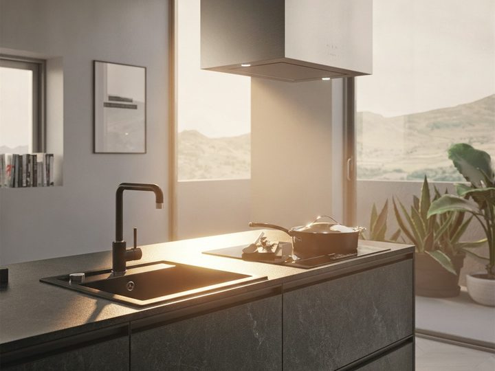 Dark stone-effect kitchen island with black sink and panoramic window over the hills