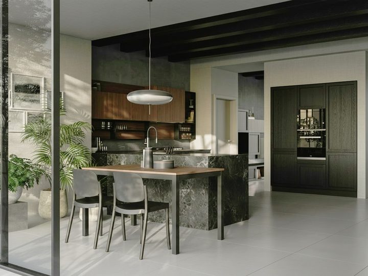 Loft kitchen with walnut wall units, dark glass-front columns, counter with black stools