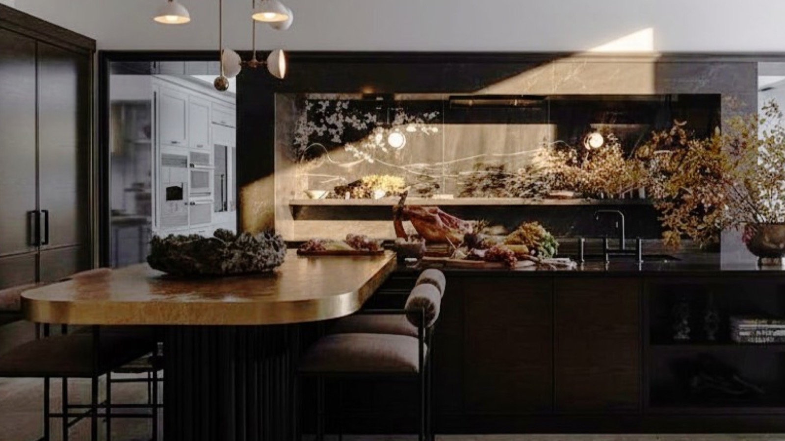 Polished solid wood kitchen with oval table, island with sink and brass details