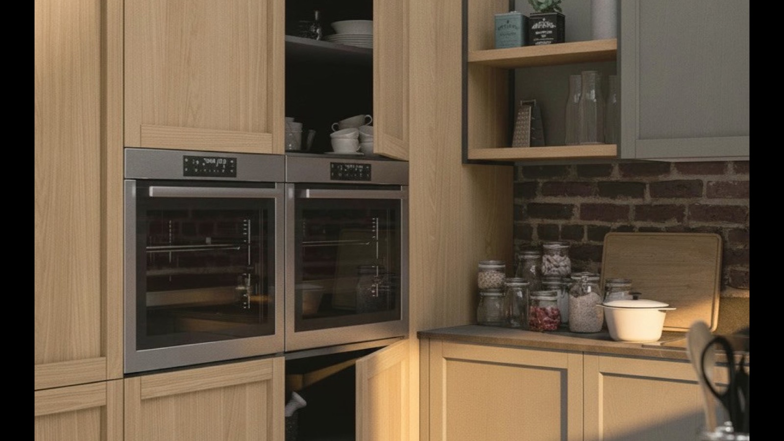 Tall kitchen unit in pale wood with double oven, open doors and exposed brick wall